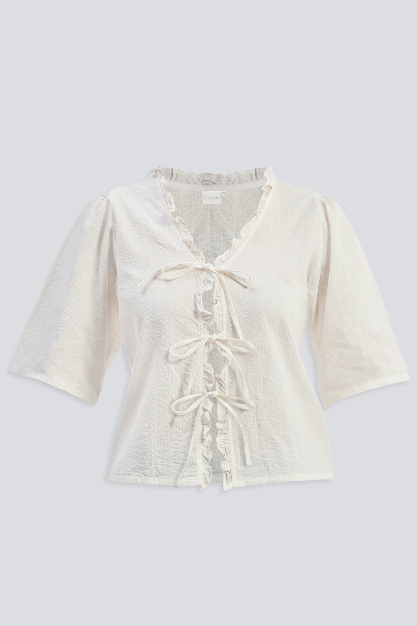 Relaxed Fit Top With Ruffles and Front-Ties in Cream